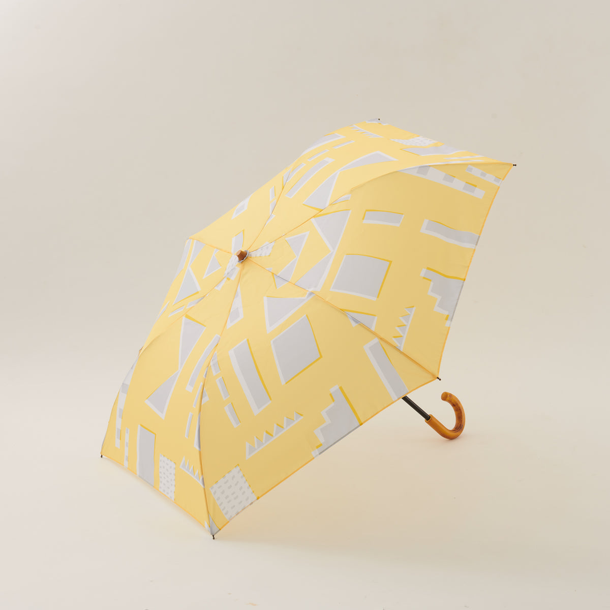 392plusm feeling柄 折りたたみ雨傘50cm イエロー 全体